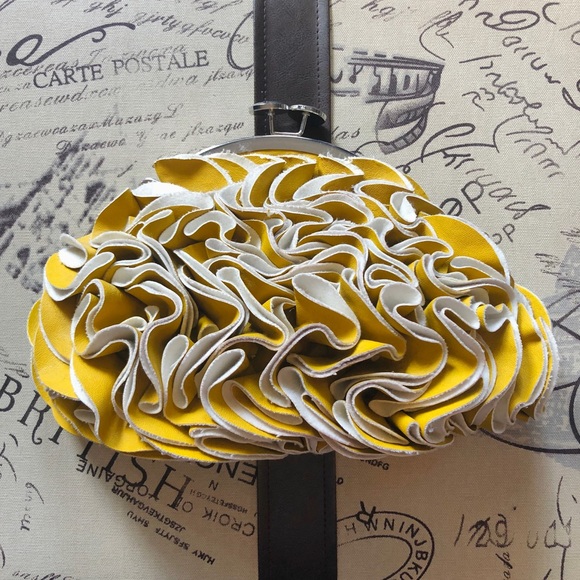 Yellow leather wave clutch with coin purse closure